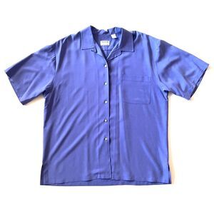 powder blue silk button up short sleeved shirt with a boxy fit